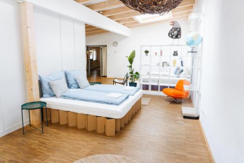 Postel nebo postele na pokoji v ubytování raum life - Quartier 10 - Gemeinsam zentral wohnen auf 300qm - Parkplätze