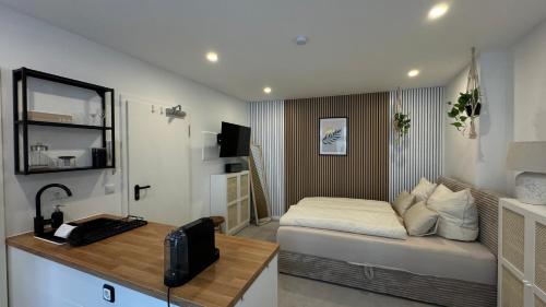 Kuchyň nebo kuchyňský kout v ubytování Design City Apartments