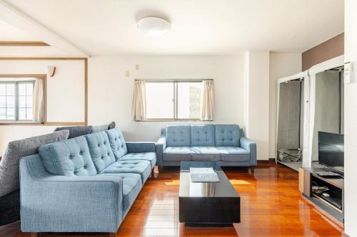 Ruang duduk di Fieldnever Apartment STAY - Maisonette Family room