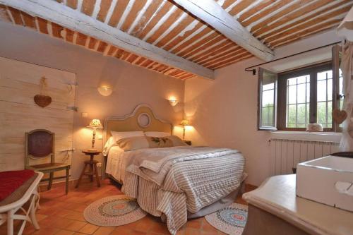 En eller flere senge i et værelse på Mas Bosca Brun