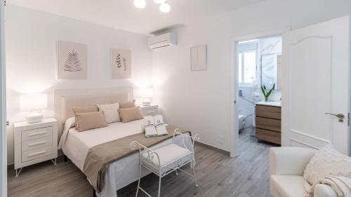 Ένα ή περισσότερα κρεβάτια σε δωμάτιο στο Casa Moreno Cómpeta by Ruralidays