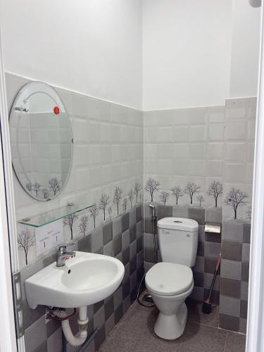 a bathroom with a toilet and a sink at Mập's Soul Hostel Đà Lạt in Da Lat