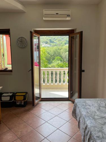 Postel nebo postele na pokoji v ubytování MarLo' Apartment in Tropea