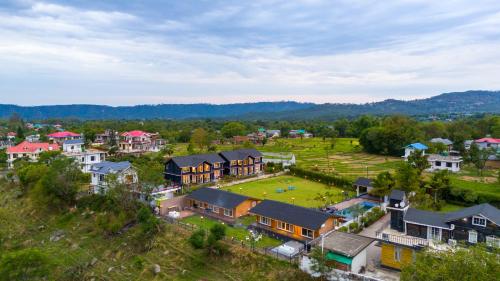 an aerial view of a home with a large yard at Luxury 4BHK with Garden Pool and Entertainment Space in Palāhu