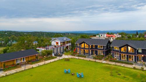 an aerial view of a house with a yard at Luxury 4BHK with Garden Pool and Entertainment Space in Palāhu