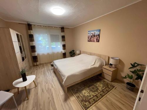 Posteľ alebo postele v izbe v ubytovaní Holiday home Fonyod 10