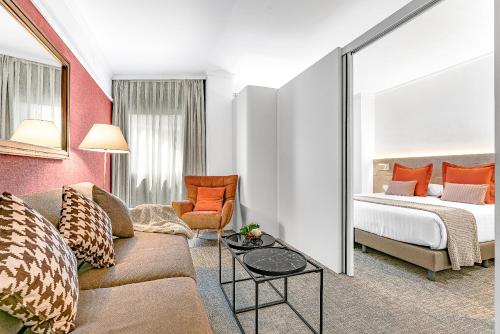 Ένα ή περισσότερα κρεβάτια σε δωμάτιο στο Acacia Suite