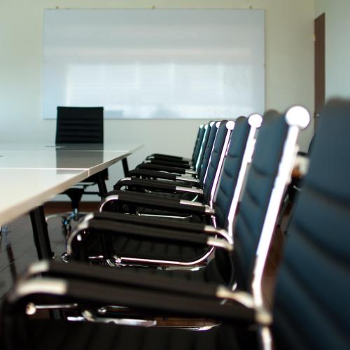 a row of chairs at a table in a classroom at Lyz Business Hotel in Lima
