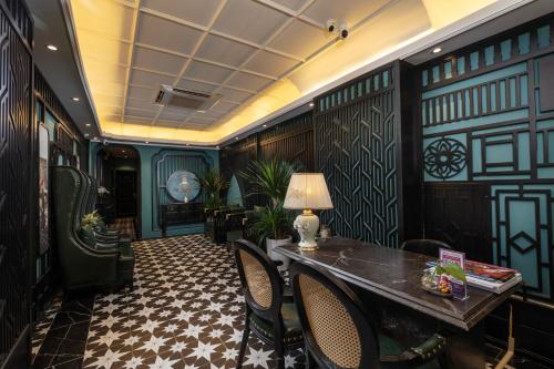 a dining room with a table and chairs at Hanoi View Hotel & Travel in Hanoi