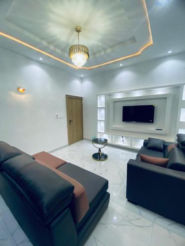 Ruang duduk di E-Vac Homes Exquisite Holiday Home