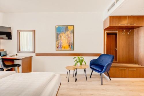 Postel nebo postele na pokoji v ubytování Hotel ANTARES