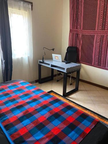Llit o llits en una habitació de Casa Holmes