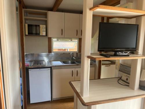 Kuchyň nebo kuchyňský kout v ubytování Camping Las Conchas de Poo