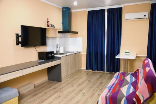 Kuchyň nebo kuchyňský kout v ubytování Travel Point hotel