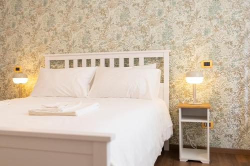 Postel nebo postele na pokoji v ubytování Mare nel Cuore Rooms Salerno