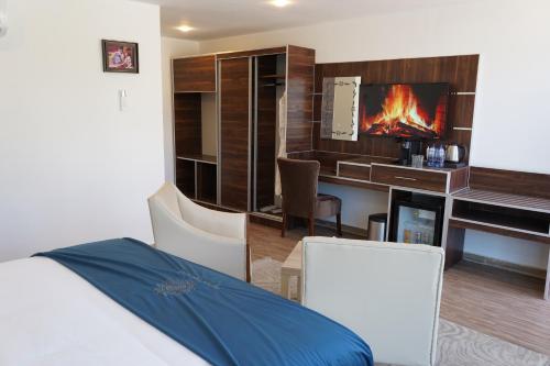 Postel nebo postele na pokoji v ubytování Petra Seasons luxury Resort