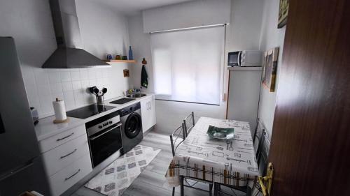 O bucătărie sau chicinetă la Apartamento en Porto do Son