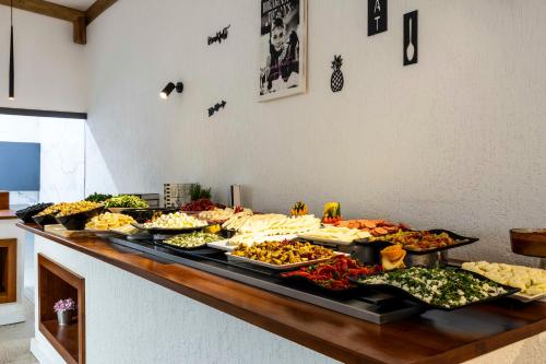 a buffet with many different types of food on a table at Costa Maya Bodrum in Bodrum City