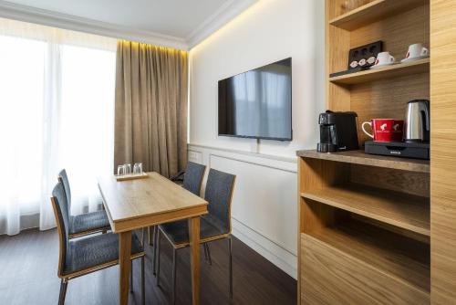 Televisyen dan/atau pusat hiburan di ARCOTEL Castellani Salzburg