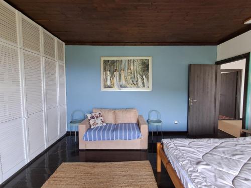 Appartement Platamonにあるベッド