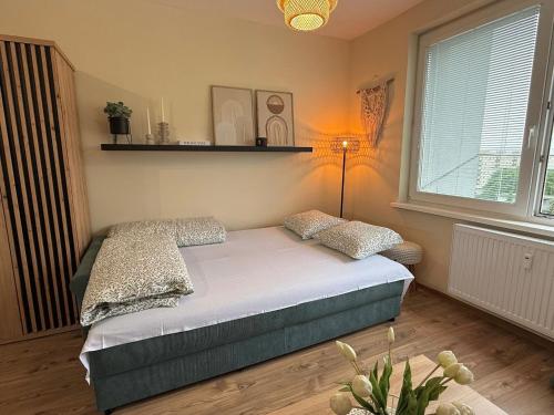 Ένα ή περισσότερα κρεβάτια σε δωμάτιο στο Liptov 4you