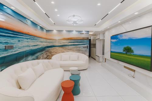 Uma televisão e/ou sistema de entretenimento em 重庆市中心家庭公寓
