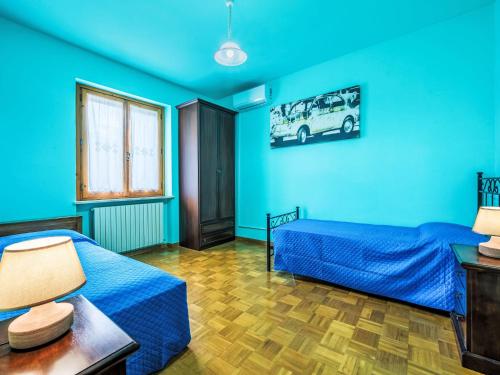 Postel nebo postele na pokoji v ubytování Holiday Home Mariani by Interhome