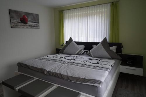 Postel nebo postele na pokoji v ubytování Ferienwohnung Bohnert
