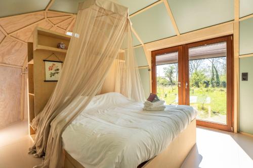 Ένα ή περισσότερα κρεβάτια σε δωμάτιο στο Cabin Atalanta