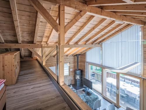 an overhead view of a room with a fireplace in a house at Chalet L'Eden by Interhome in Ovronnaz