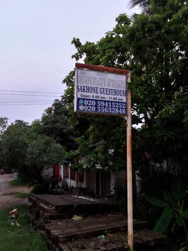 a sign for a santiago christchurchchurch at Sakhone guesthouse in Ban Pho Touane