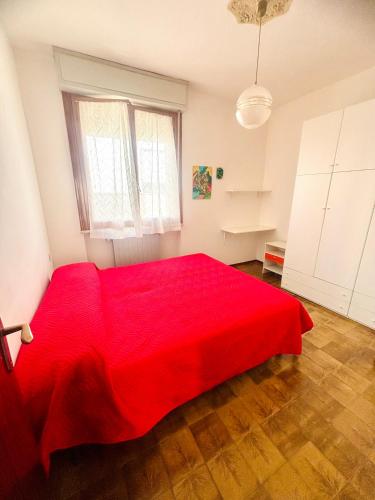 Katil atau katil-katil dalam bilik di Appartamento in centro a 2 passi dal mare