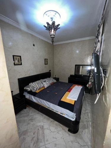 Ένα ή περισσότερα κρεβάτια σε δωμάτιο στο Cozy apartment in center
