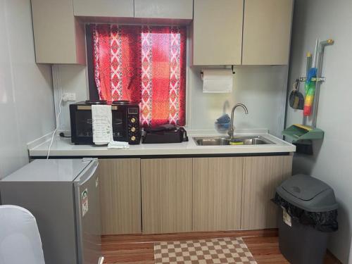 Kuchyň nebo kuchyňský kout v ubytování Mona's Place