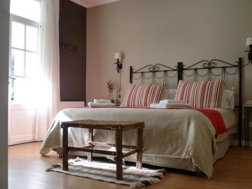 Ένα ή περισσότερα κρεβάτια σε δωμάτιο στο Hostería La Casa de Eugenia