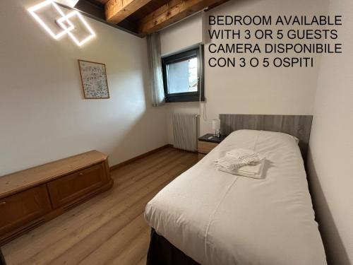 Postel nebo postele na pokoji v ubytování La Casa di Adele
