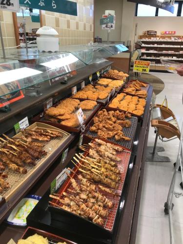 a buffet line with many different types of food at Right nearby world heritage! 2BR Nikko Stay house in Nikko