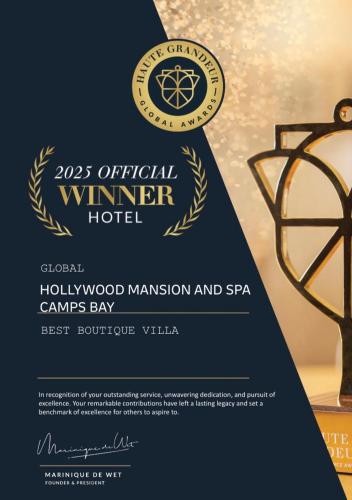 a sign for a winchester winter hotel with a trophy at Hollywood Mansion & Spa Camps Bay in Cape Town