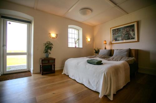 Postel nebo postele na pokoji v ubytování AvalonBnB