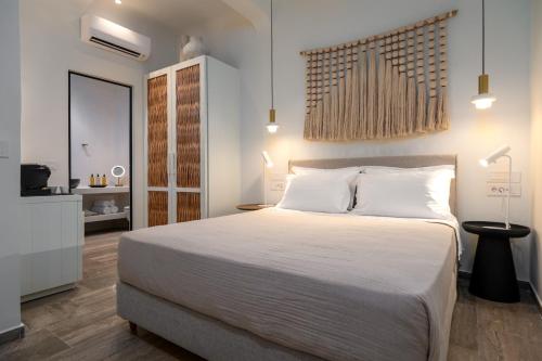 Postel nebo postele na pokoji v ubytování Hotel Oasis