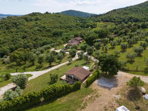 an aerial view of a farm with a house at Poggio Diavolino - Suvereto in Suvereto