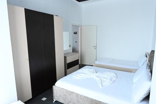 Cama o camas de una habitación en Tafi Appart Hotel