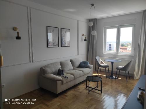 Posezení v ubytování Lullaby apartment 2, moderan stan sa spavaćom sobom i besplatnim parkingom