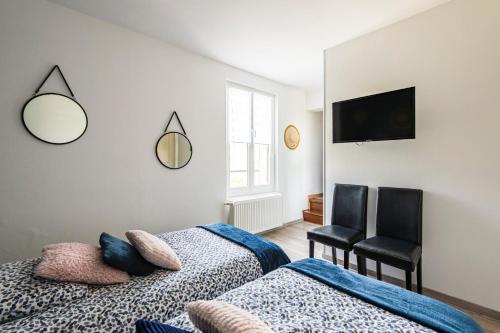 Postel nebo postele na pokoji v ubytování Gîte de la Liberté