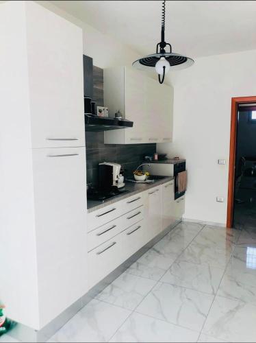 Η κουζίνα ή μικρή κουζίνα στο Casa Vacanze "LE DUE RONDINI"