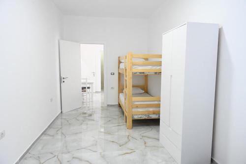Cama o camas de una habitación en Tafi Appart Hotel