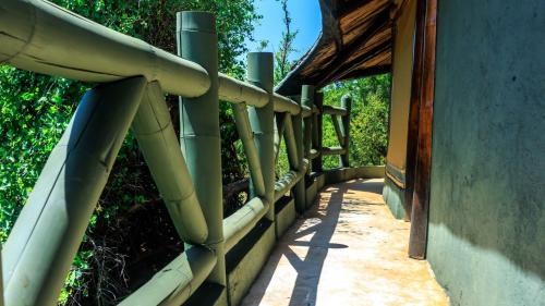 a wooden fence next to a building at Samburu Elephant Lodge in Isiolo