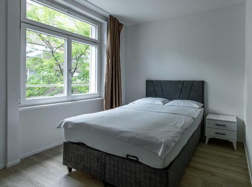 Ένα ή περισσότερα κρεβάτια σε δωμάτιο στο Luxury Apartments by Livingdowntown