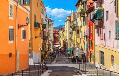 a view of an alley between buildings at PANORAMIC SEA VIEW - Air conditioning - Terrace - 2 Bedrooms - Kitchen - Wifi - Tramway in Nice