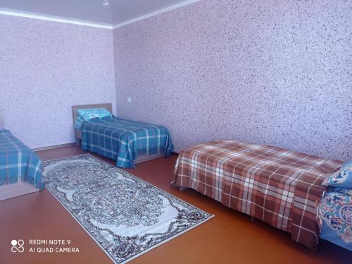 Ένα ή περισσότερα κρεβάτια σε δωμάτιο στο kadzhisaihouse